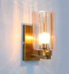 Modern Brass Finish Wall Sconce with Amber Glass Shade