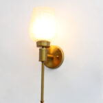 Elegant Golden Finish Wall Sconce with White Crackled Glass