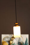 Elegant Ceramic Pendant Light with Floral Pattern