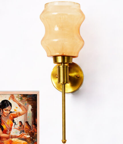Lamp Amber Glass wall light with sculpted amber shade and brass finish, featuring a vertical stem design and warm ambient illumination