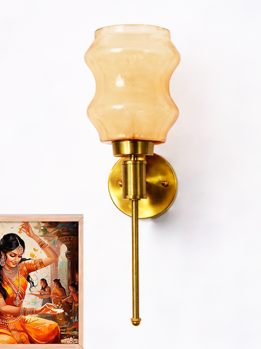 Damru Glass Designer Wall Lamp Amber Glass Lamp Amber Glass wall light with sculpted amber shade and brass finish, featuring a vertical stem design and warm ambient illumination