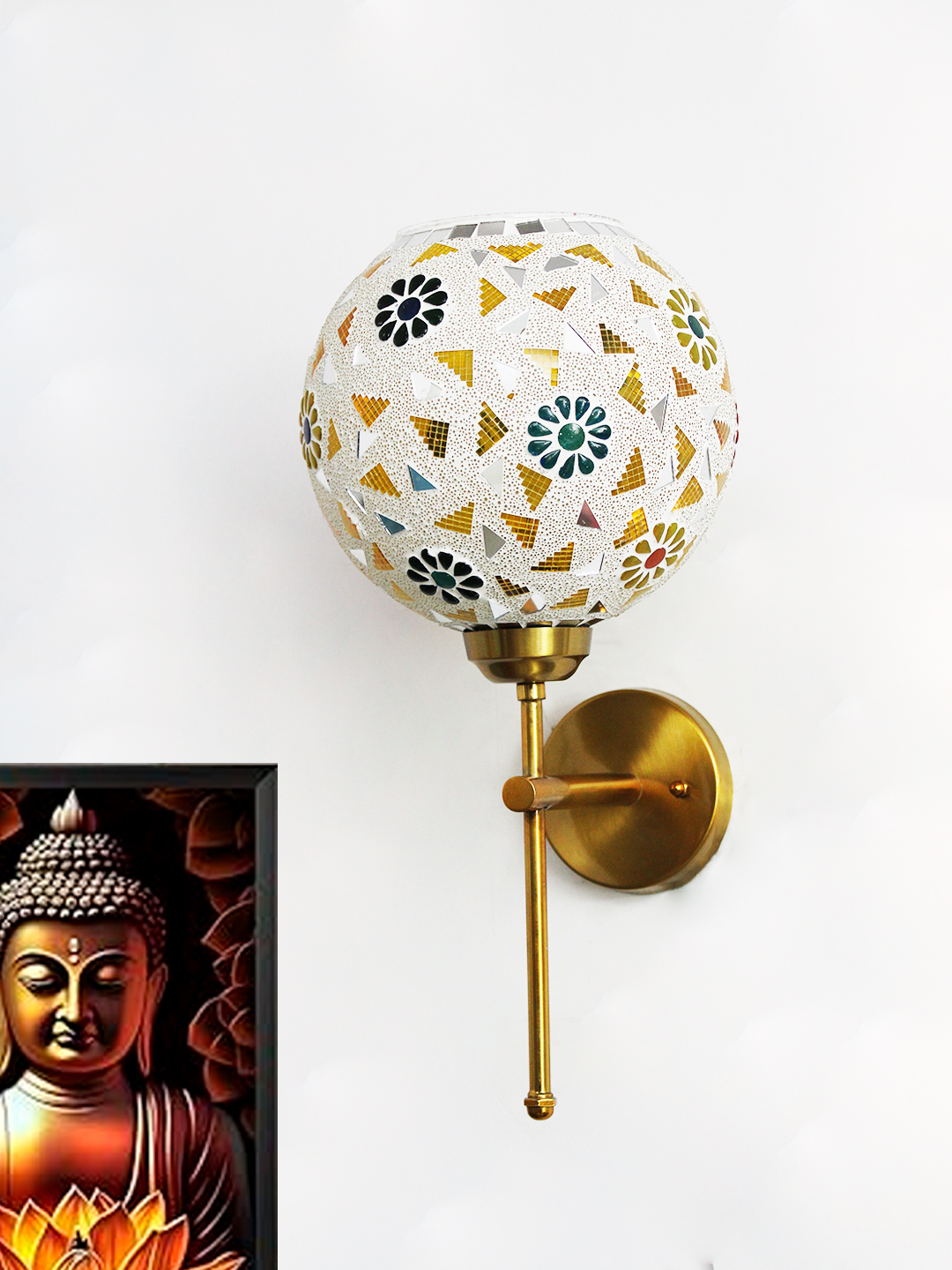 Artistic Mosaic Glass Brass Wall Light Home Décor Elegant gold wall-mounted mosaic lamp with spherical glass shade featuring intricate geometric and floral patterns, casting warm ambient light on a modern interior wall.
