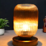 Ribbed Glass Table Lamp with amber ribbed glass shade, brass finish round base, decorative modern bedside and living room table lamp design