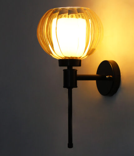 Amber Kharbuja Glass wall light with ribbed amber glass globe shade and matte black metal wall mount for elegant modern indoor lighting
