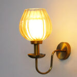 Ribbed Tulip Glass Wall Light with amber ribbed glass shade and brass finish curved arm decorative wall lamp for bedroom and living room