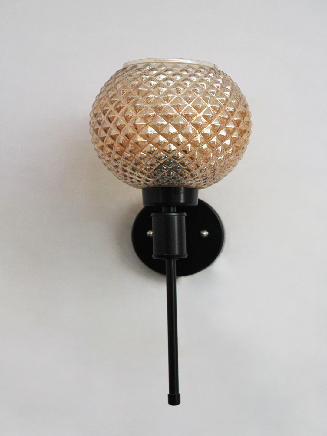 Amber Diamond Glass Black Wall Sconce Diamond Glass Black Wall Sconce with amber textured glass globe shade and matte black metal wall mount for modern decorative indoor lighting