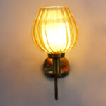 Ribbed Tulip Glass Wall Light with amber ribbed glass shade and brass finish curved arm decorative wall lamp for bedroom and living room