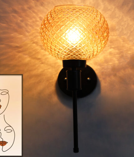 Diamond Glass Black Wall Sconce with amber textured glass globe shade and matte black metal wall mount for modern decorative indoor lighting