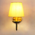 Beige Fabric Shade Wall Lamp with antique brass finish and curved arm wall sconce for bedroom, living room, and hallway décor