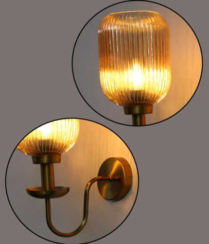 Amber Glass Curved Arm Wall Lamp with ribbed glass shade and antique brass finish for bedroom, living room, and hallway décor