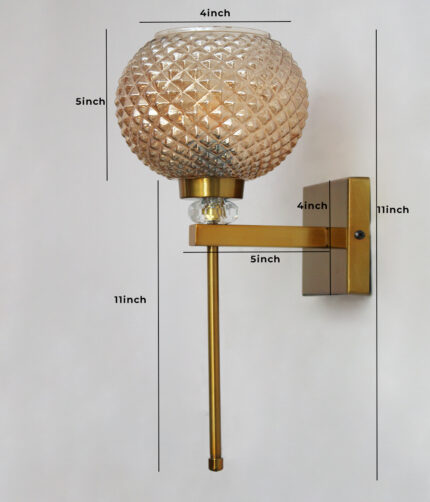 Amber Diamond Cut wall lamp with textured amber glass shade, brass finish body, and decorative crystal accent for elegant interior lighting