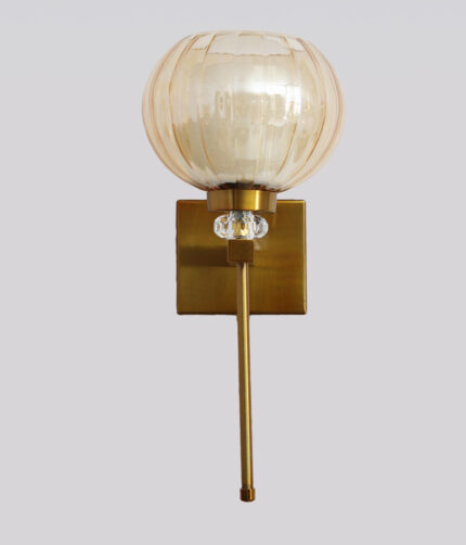 Amber Kharbuja Wall Sconce with amber melon-shaped glass shade, brass finish body, crystal accent, and decorative wall lighting design