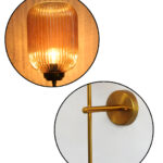 Amber Ribbed Glass Wall Lamp with ribbed amber glass shade and brass finish metal wall mount for elegant modern indoor lighting