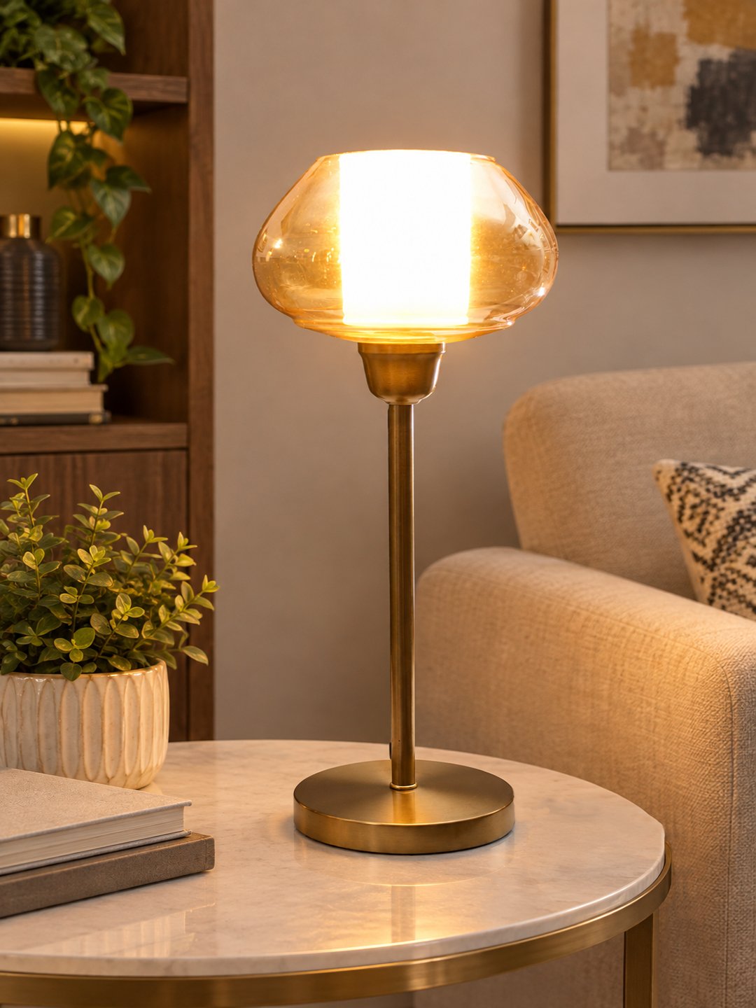 Amber Kachori Vintage Table Lamp Amber Kachori Vintage table lamp with rounded amber glass shade and brass base, providing warm decorative lighting for bedside or living room use