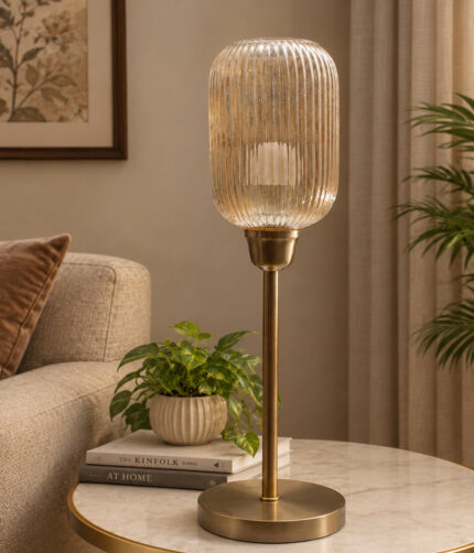 Elara Ribbed Cylinder table lamp with tall ribbed glass shade and brass base, modern decorative lighting for bedside, living room, or workspace