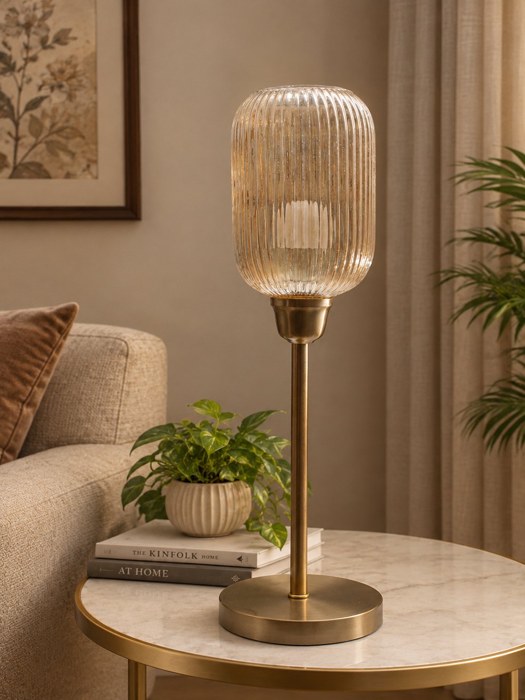 Elara Ribbed Cylinder Table Lamp Elara Ribbed Cylinder table lamp with tall ribbed glass shade and brass base, modern decorative lighting for bedside, living room, or workspace
