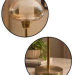 Amber Kachori Vintage table lamp with rounded amber glass shade and brass base, providing warm decorative lighting for bedside or living room use