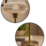 Aurora Ribbed Glass table lamp with wide ribbed amber glass shade and brass base, modern decorative lighting for bedside or living room use