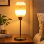 Elara Ribbed Cylinder table lamp with tall ribbed glass shade and brass base, modern decorative lighting for bedside, living room, or workspace