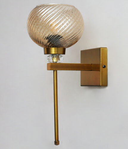 Doom MF Amber Glass wall light with ribbed dome-shaped amber glass shade, brass finish arm, and elegant vertical rod for decorative interior lighting