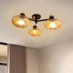 Solara 3-Light chandelier with three ribbed amber glass shades and a matte black metal frame, modern semi-flush ceiling light for dining rooms, living rooms, kitchens, and bedrooms.