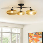Ribbed Glass Chandelier with three amber ribbed glass shades and a matte black metal frame, modern semi-flush ceiling light for dining room, living room, and kitchen.