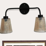 Florence Ribbed Glass dual-light wall sconce with textured ribbed glass shades and a matte black metal frame, perfect for modern bedrooms, hallways, living rooms, and dining spaces.