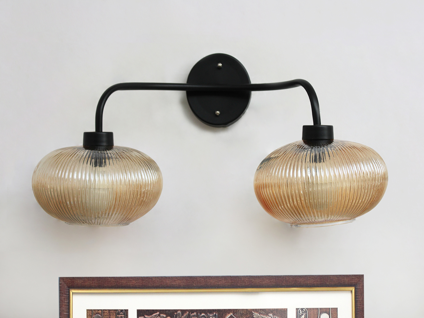 Aurora 2-Light Ribbed Glass Wall Sconce **Alt Text:** **2-Light Ribbed Glass** wall light with dual amber ribbed glass shades and a matte black metal frame, modern wall-mounted fixture for bedrooms, hallways, living rooms, and dining spaces.