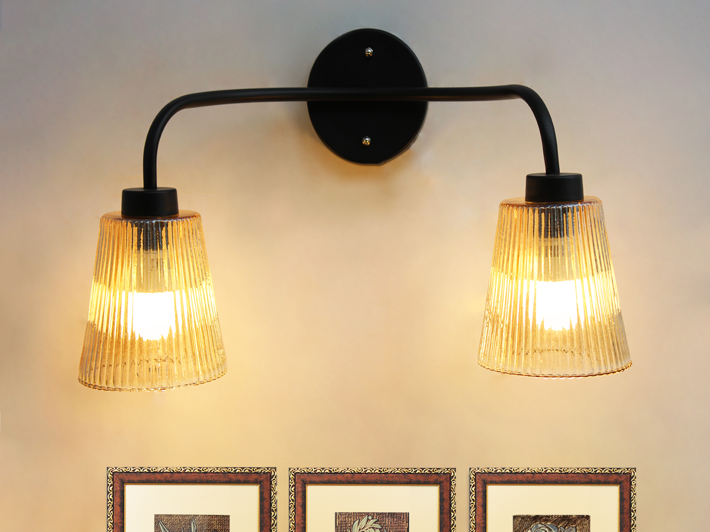 Florence Ribbed Glass Wall Light Florence Ribbed Glass dual-light wall sconce with textured ribbed glass shades and a matte black metal frame, perfect for modern bedrooms, hallways, living rooms, and dining spaces.