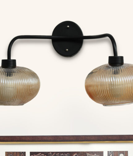 **Alt Text:** **2-Light Ribbed Glass** wall light with dual amber ribbed glass shades and a matte black metal frame, modern wall-mounted fixture for bedrooms, hallways, living rooms, and dining spaces.