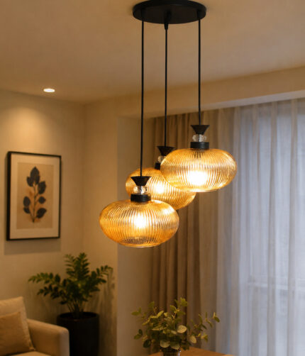 Amber Ribbed Glass cluster hanging light with four textured glass pendant shades, black metal fittings, and layered design for modern interior lighting.