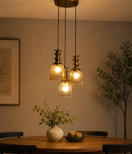 Ribbed Glass 3-Light adjustable pendant ceiling light with three textured glass shades, golden metal accents, black adjustable cords, 9-inch canopy, and elegant modern hanging design.