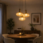 Ribbed Amber Kachori Glass 3-light adjustable pendant ceiling light with three rounded textured amber ribbed glass shades, elegant golden metal holders, 9-inch ceiling canopy, and 23-inch adjustable hanging cords.