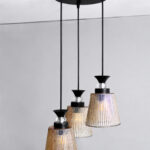 3-Light Ribbed Glass cluster hanging light with three clear ribbed shades, adjustable 23-inch height and black ceiling canopy.