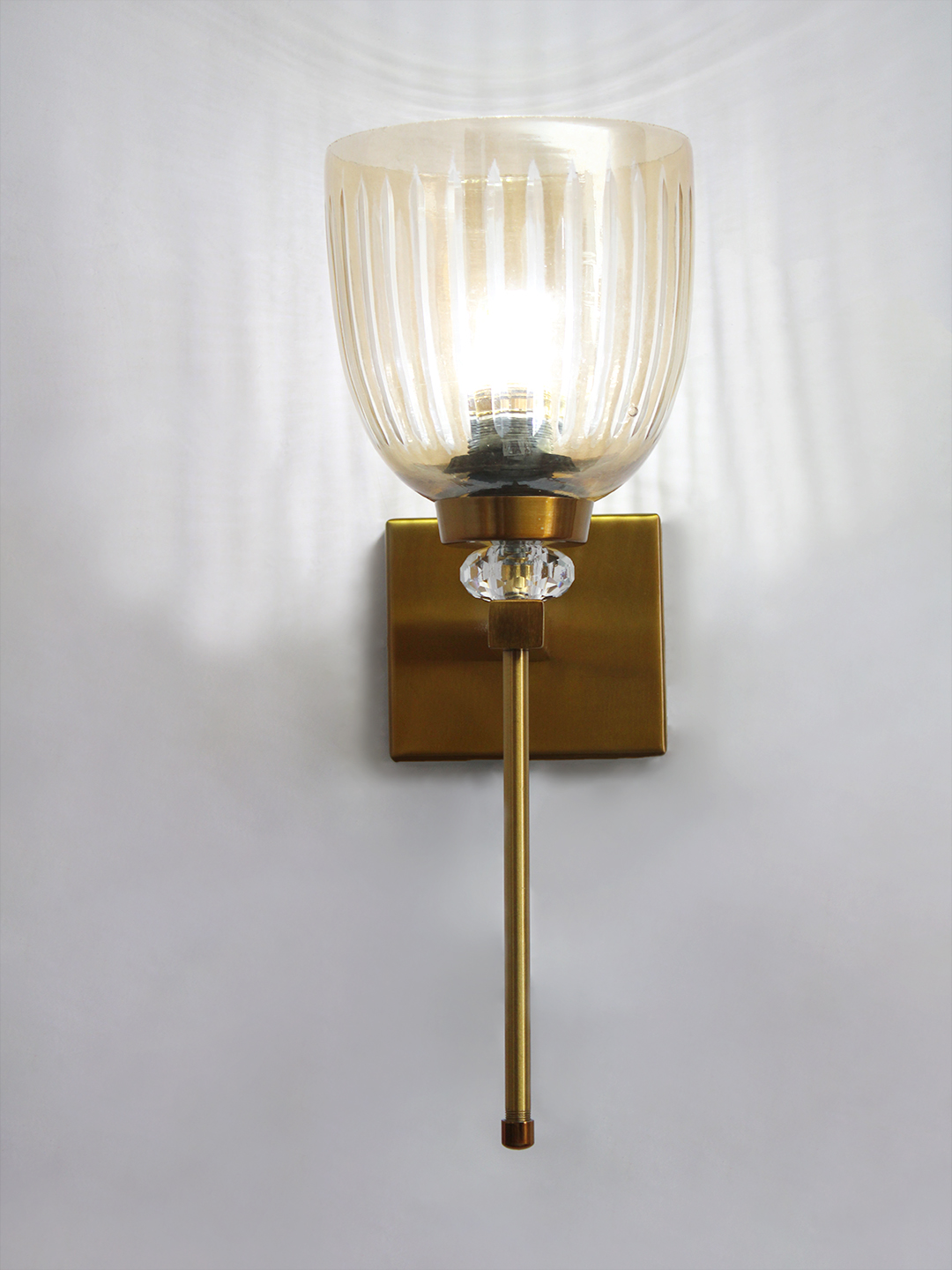 Brass Finish Ribbed Glass Wall Sconce Brass finish wall light with ribbed glass shade, crystal accent and rectangular wall plate shown with product dimensions.