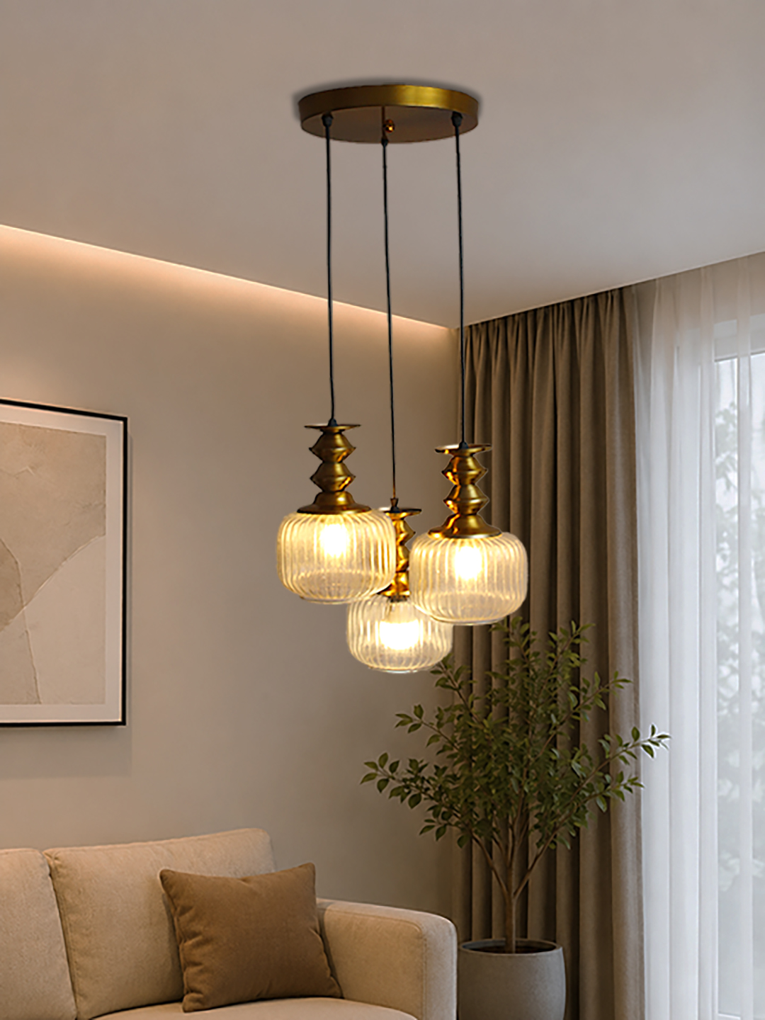 3-Light Ribbed Clear Glass Cluster Hanging Light 3-Light Ribbed Clear Glass adjustable pendant ceiling light with three 6-inch textured clear ribbed glass shades, decorative golden metal holders, black adjustable hanging cords, 9-inch circular canopy, and up to 23-inch adjustable height.