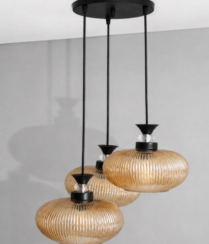 Amber Ribbed Glass cluster hanging light with four textured glass pendant shades, black metal fittings, and layered design for modern interior lighting.