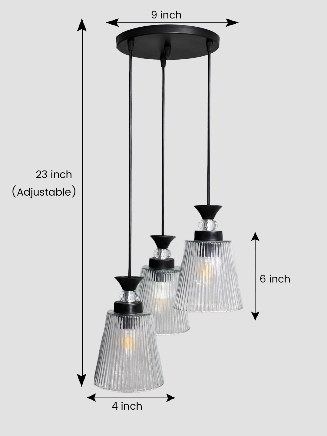 Modern Triple Glass Cluster Hanging Light Modern Triple Glass cluster hanging light with three clear ribbed glass shades and black metal ceiling mount.
