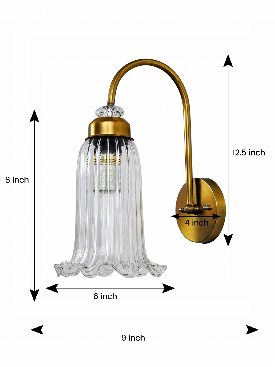 Antique Brass Fluted Glass Wall Sconce Antique brass fluted glass wall light with curved arm and decorative textured glass shade
