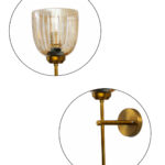 Antique brass wall light with amber ribbed glass shade and curved arm, shown with product dimensions.