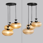 Amber Ribbed Glass cluster hanging light with four textured glass pendant shades, black metal fittings, and layered design for modern interior lighting.