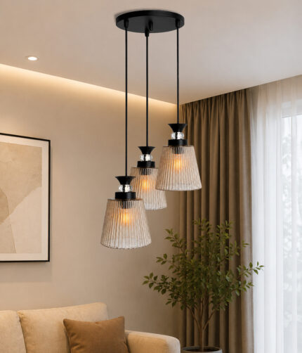 3-Light Ribbed Glass cluster hanging light with three clear ribbed shades, adjustable 23-inch height and black ceiling canopy.
