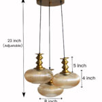 Ribbed Amber Kachori Glass 3-light adjustable pendant ceiling light with three rounded textured amber ribbed glass shades, elegant golden metal holders, 9-inch ceiling canopy, and 23-inch adjustable hanging cords.
