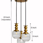 3-Light Ribbed Clear Glass adjustable pendant ceiling light with three 6-inch textured clear ribbed glass shades, decorative golden metal holders, black adjustable hanging cords, 9-inch circular canopy, and up to 23-inch adjustable height.