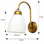 Antique brass frosted glass wall light with curved arm and white shade, 11-inch decorative wall lamp for bedroom and living room.