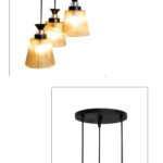 3-Light Ribbed Glass cluster hanging light with three clear ribbed shades, adjustable 23-inch height and black ceiling canopy.