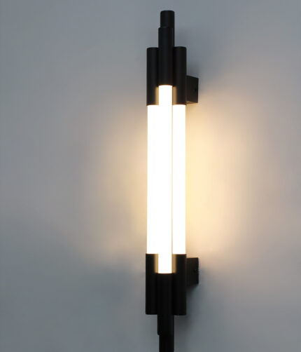 Black vertical LED wall light with multiple white diffusers and slim modern design