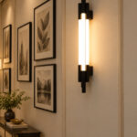 Black vertical LED wall light with multiple white diffusers and slim modern design