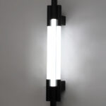 Black vertical LED wall light with multiple white diffusers and slim modern design
