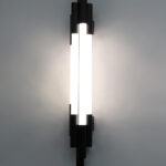 Black vertical LED wall light with multiple white diffusers and slim modern design